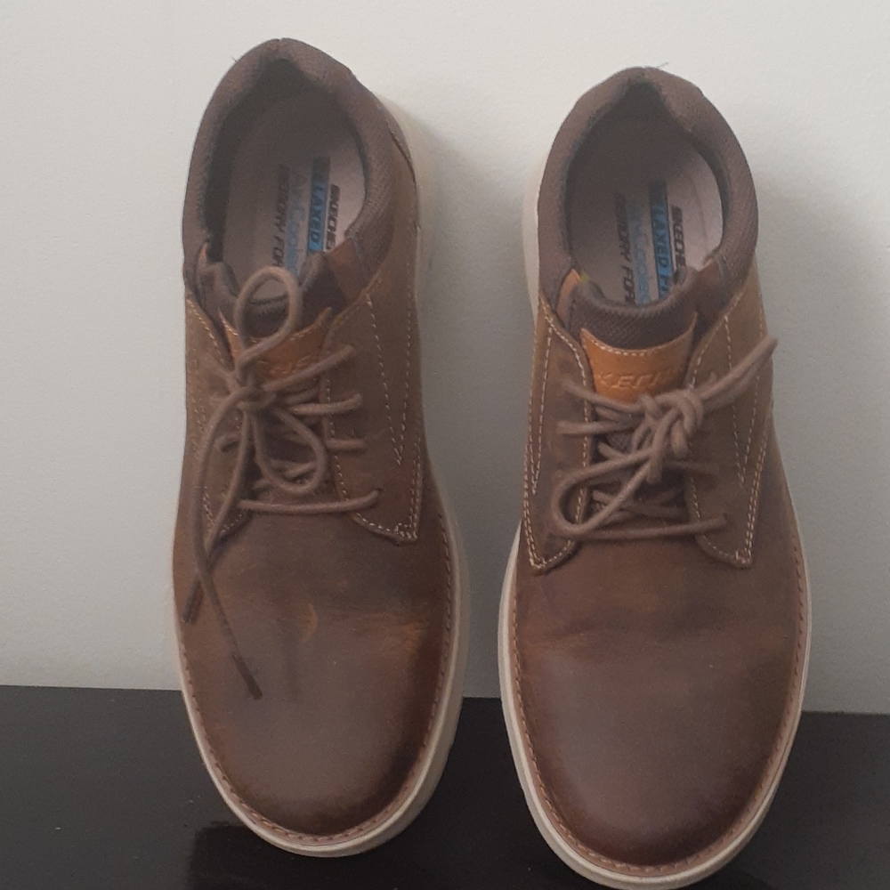 New, never worn, Skechers shoes.